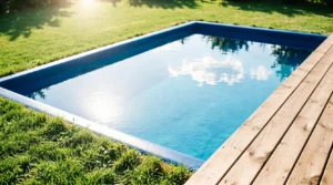 Rectangular swimming pool with smooth blue vinyl liner