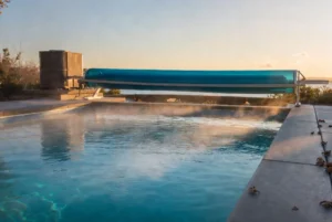 Guide to efficiently heating an inground swimming pool with covers and heat pumps